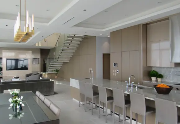 Man using a planar to smooth the surface of wood