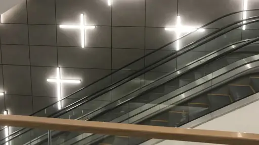 an escalator in a building